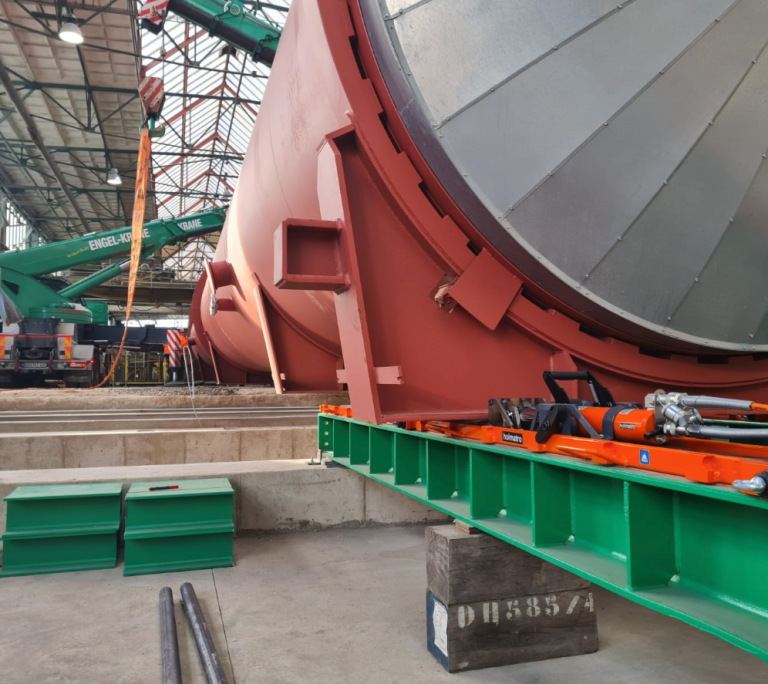 Close up of skidding system being used to move a large piece of equipment.