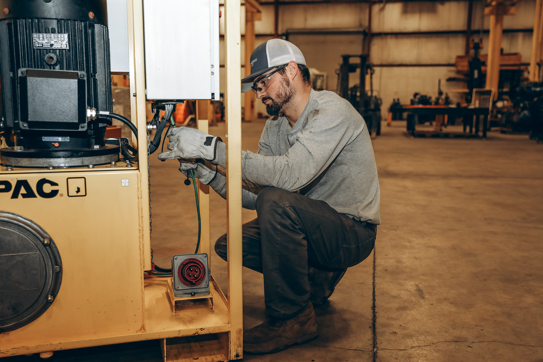Technician working on split flow pump.
