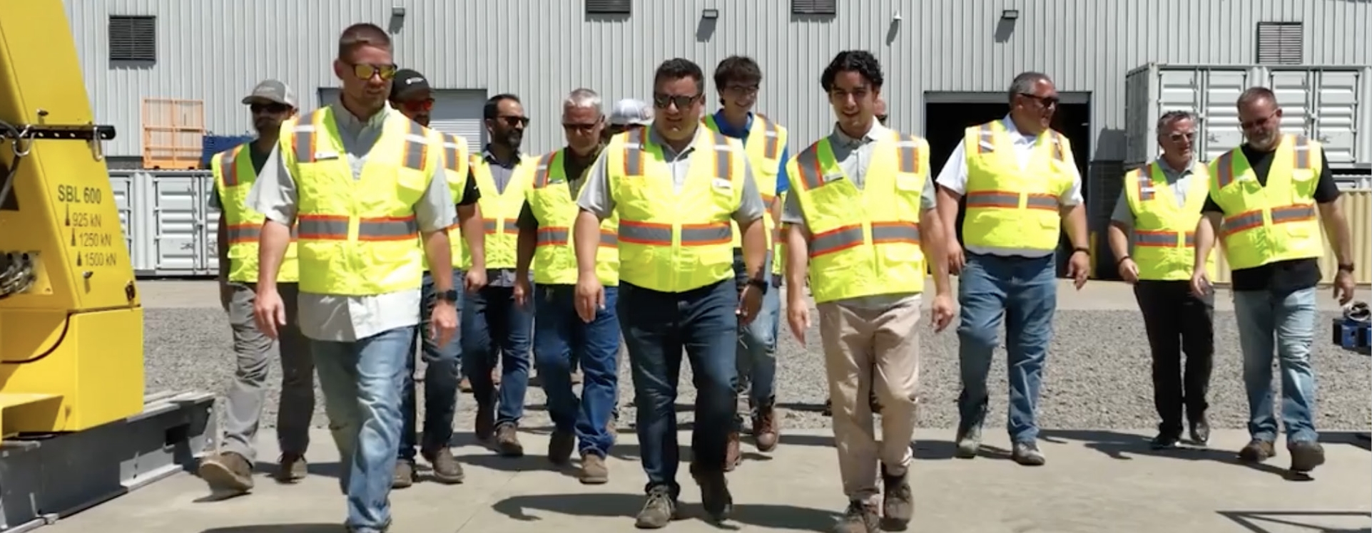 ER team in safety vests, walking toward the camera.