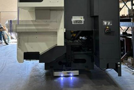 Skate positioned under heavy equipment.