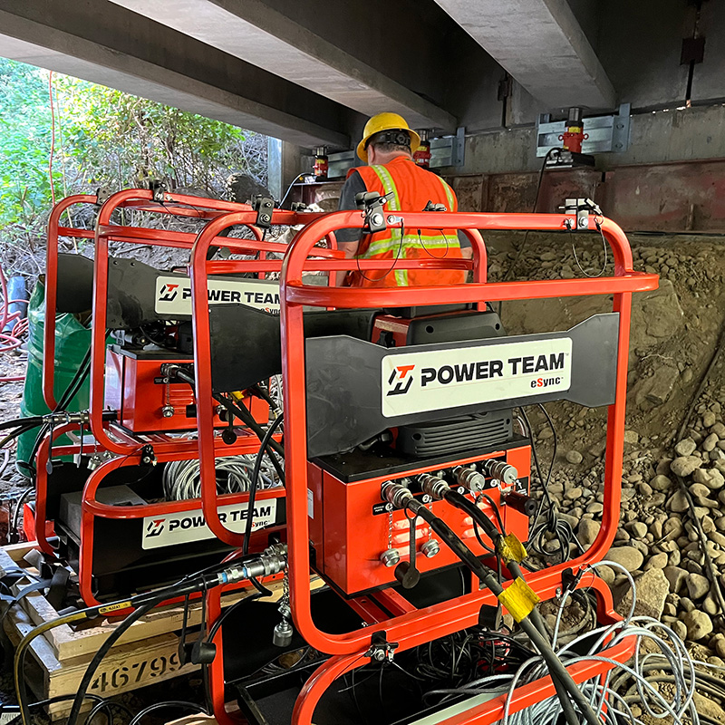 Man working on a bridge bearing replacement project.