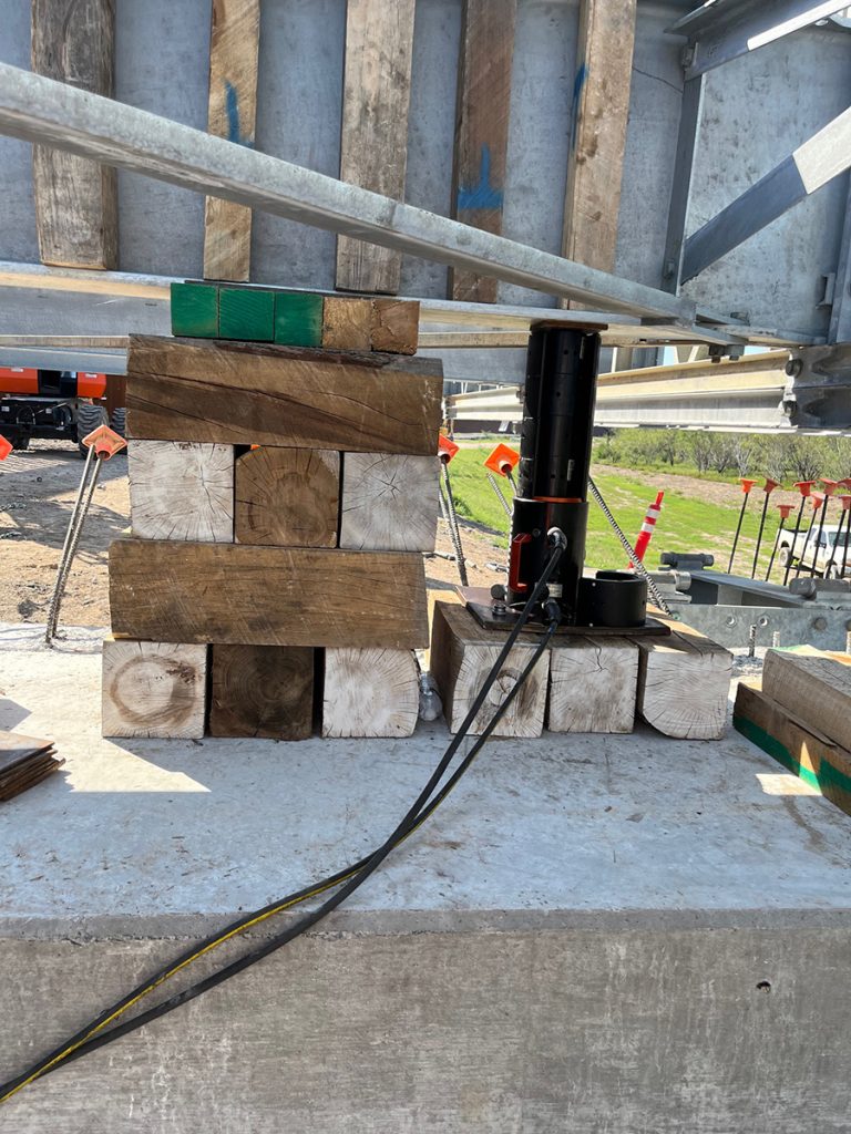 Close up of ring climbing cylinders being used on the bridge project.