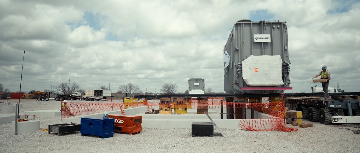 Power transformer travels along the tracks of the PS500 Power Slide.